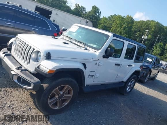 ✅ 2020 Jeep Wrangler Unlimited Sahara • VIN: 1C4HJXEN3LW256969 • Lot: 42719059. Listed on IAAI with 36,922 mi. Free auction sales archive from the USA and detailed vehicle history report at DreamBid. Image 15.