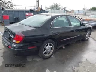 ✅ 2001 Oldsmobile Aurora • VIN: 1G3GS64C114109870 • Лот: 43704471. Опубликован ранее на IAAI с пробегом 141 335 миль. Бесплатный доступ к архиву аукционных продаж из США и подробный отчёт об истории автомобиля на DreamBid. Изображение 4.