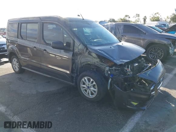 ✅ 2021 Ford Transit Connect XLT • VIN: NM0GS9F26M1487725 • Lot: 43704125. Listed on IAAI with 59,567 mi. Free auction sales archive from the USA and detailed vehicle history report at DreamBid. Image 1.