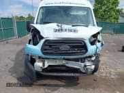 ✅ 2016 Ford Transit Cargo • VIN: 1FTYE1CM1GKA29370 • Lot: 42177908. Wystawiony na IAAI z przebiegiem 155 718 mil. Bezpłatny archiwum sprzedaży aukcyjnych z USA i szczegółowy raport historii pojazdu na DreamBid. Zdjęcie 6.