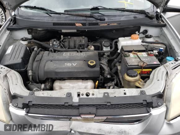 2007 Chevrolet Aveo LS z VIN KL1TD56647B124787, wystawiony jako Copart lot #44301344 z przebiegiem Nie podano mil oraz Szkoda całkowita • Salvage title. Historia ofert i sprzedaży dostępna na DreamBid. Obrazek 11.