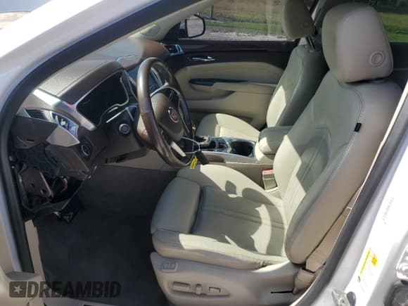 ✅ 2014 Cadillac SRX Performance Collection • VIN: 3GYFNCE30ES643443 • Lot: 78481064. Listed on Copart with 106,657 mi. Free auction sales archive from the USA and detailed vehicle history report at DreamBid. Image 7.