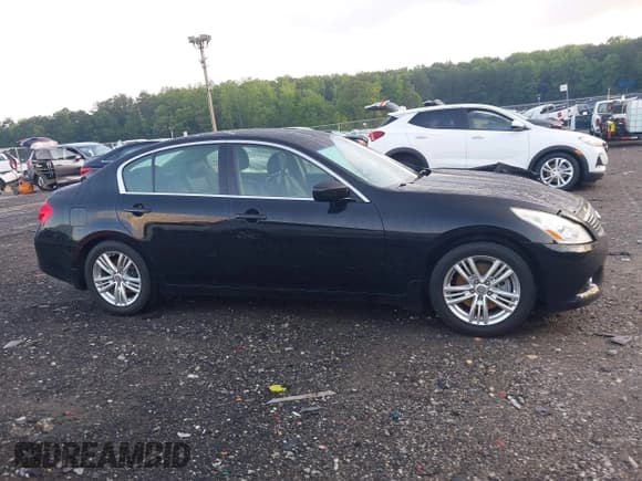 ✅ 2013 Infiniti G37 Journey • VIN: JN1CV6AP9DM719603 • Lot: 42307556. Listed on IAAI with 142,437 mi. Free auction sales archive from the USA and detailed vehicle history report at DreamBid. Image 14.