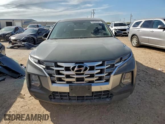 ✅ 2022 Hyundai Santa Cruz SEL • VIN: 5NTJB4AE9NH031484 • Лот: 94648595. Опубликован ранее на Copart с пробегом 127 487 миль. Бесплатный доступ к архиву аукционных продаж из США и подробный отчёт об истории автомобиля на DreamBid. Изображение 5.