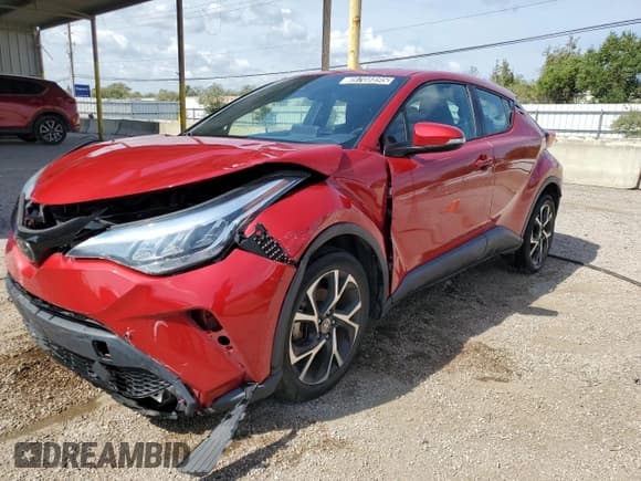 ✅ 2022 Toyota C-HR XLE • VIN: NMTKHMBX8NR143249 • Лот: 89708895. Опубликован ранее на Copart с пробегом 49 972 миль. Бесплатный доступ к архиву аукционных продаж из США и подробный отчёт об истории автомобиля на DreamBid. Изображение 1.
