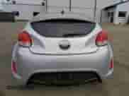 2016 Hyundai Veloster z VIN KMHTC6AD0GU302234, wystawiony jako Copart lot #72372854 z przebiegiem 89 373 mil mil oraz Szkoda całkowita • Salvage title. Historia ofert i sprzedaży dostępna na DreamBid. Obrazek 6.