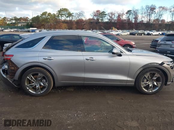 ✅ 2024 Genesis GV70 Advanced • VIN: 5NMMCET16RH003394 • Lot: 43588516. Listed on IAAI with 22,811 mi. Free auction sales archive from the USA and detailed vehicle history report at DreamBid. Image 13.