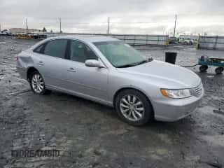 2007 Hyundai Azera SE z VIN KMHFC46F47A202070, wystawiony jako Copart lot #80811434 z przebiegiem 98 692 mil mil oraz Szkoda całkowita • Salvage title. Historia ofert i sprzedaży dostępna na DreamBid. Obrazek 4.