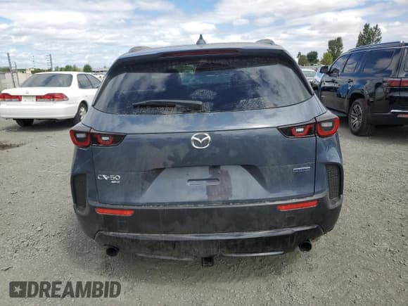 ✅ 2025 Mazda CX-50 Hybrid Premium Package • VIN: 7MMVAADW9SN112986 • Лот: 69371725. Опубликован ранее на Copart с пробегом 10 722 миль. Бесплатный доступ к архиву аукционных продаж из США и подробный отчёт об истории автомобиля на DreamBid. Изображение 6.