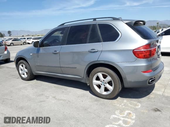 ✅ 2011 BMW X5 50i • VIN: 5UXZV8C57BL418229 • Lot: 50448595. Listed on Copart with 104,962 mi. Free auction sales archive from the USA and detailed vehicle history report at DreamBid. Image 2.