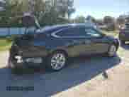 2018 Chevrolet Impala LT z VIN 1G1105S34JU114062, wystawiony jako Copart lot #90459015 z przebiegiem 156 686 mil mil oraz Szkoda całkowita • Salvage title. Historia ofert i sprzedaży dostępna na DreamBid. Obrazek 3.