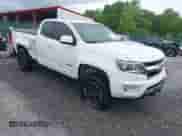 2020 Chevrolet Colorado 4WD LT z VIN 1GCHTCEA0L1224915, wystawiony jako IAAI lot #42300579 z przebiegiem 62 623 mil mil oraz . Historia ofert i sprzedaży dostępna na DreamBid. Obrazek 1.