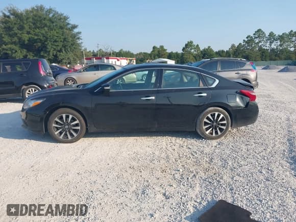 ✅ 2018 Nissan Altima SR • VIN: 1N4AL3APXJC150759 • Лот: 43195601. Опубликован ранее на IAAI с пробегом 171 749 миль. Бесплатный доступ к архиву аукционных продаж из США и подробный отчёт об истории автомобиля на DreamBid. Изображение 14.