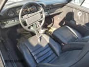 ✅ 1986 Porsche 911 • VIN: WP0EB0917GS161455 • Lot: 74672764. Wystawiony na Copart z przebiegiem 80 076 mil. Bezpłatny archiwum sprzedaży aukcyjnych z USA i szczegółowy raport historii pojazdu na DreamBid. Zdjęcie 8.