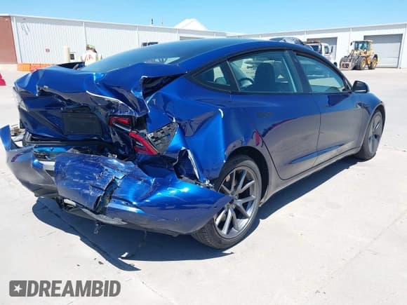 ✅ 2021 Tesla Model 3 Standard Range Plus • VIN: 5YJ3E1EA9MF027615 • Lot: 42072322. Listed on IAAI with 22,944 mi. Free auction sales archive from the USA and detailed vehicle history report at DreamBid. Image 4.