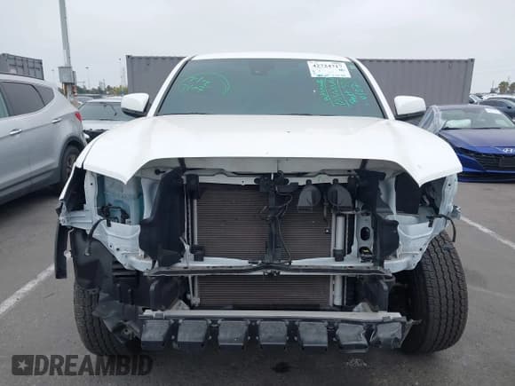 ✅ 2023 Toyota Tacoma SR5 • VIN: 3TMDZ5BN9PM169017 • Lot: 42724717. Listed on IAAI with 28,467 mi. Free auction sales archive from the USA and detailed vehicle history report at DreamBid. Image 13.