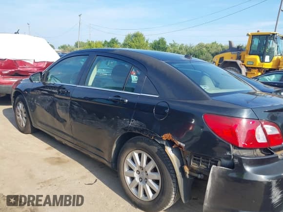 ✅ 2007 Chrysler Sebring • VIN: 1C3LC46KX7N516940 • Lot: 42906254. Listed on IAAI with 105,445 mi. Free auction sales archive from the USA and detailed vehicle history report at DreamBid. Image 6.