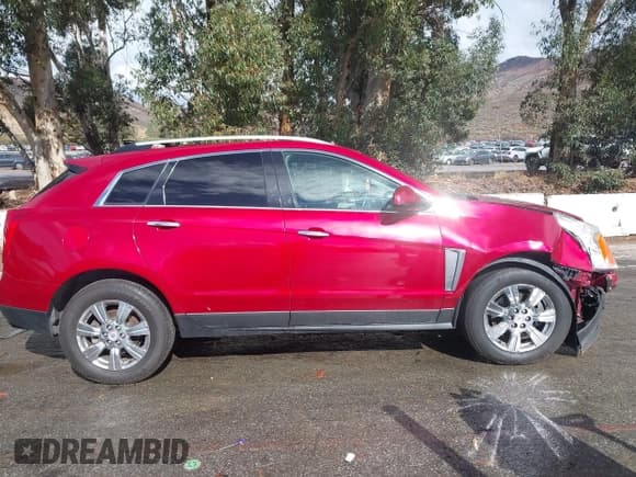 ✅ 2014 Cadillac SRX Luxury Collection • VIN: 3GYFNEE39ES669907 • Lot: 43769877. Listed on IAAI with 163,691 mi. Free auction sales archive from the USA and detailed vehicle history report at DreamBid. Image 13.