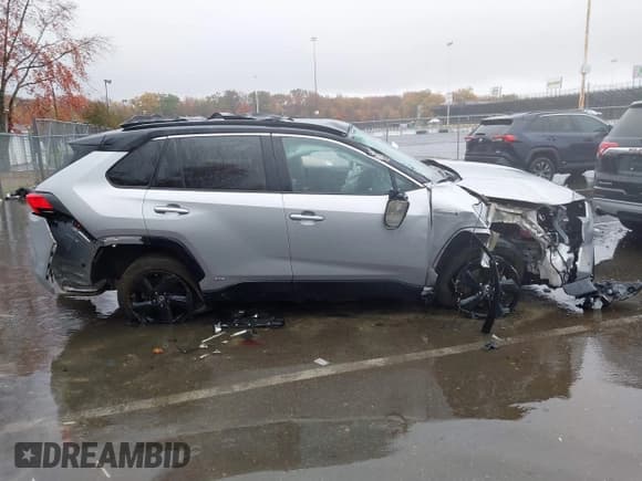 ✅ 2021 Toyota RAV4 Hybrid XSE • VIN: 4T3E6RFV1MU059801 • Lot: 43580158. Listed on IAAI with 55,041 mi. Free auction sales archive from the USA and detailed vehicle history report at DreamBid. Image 13.