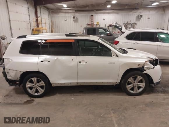 ✅ 2012 Toyota Highlander Limited • VIN: 5TDDK3EH1CS157064 • Lot: 43713808. Listed on IAAI with 166,092 mi. Free auction sales archive from the USA and detailed vehicle history report at DreamBid. Image 13.