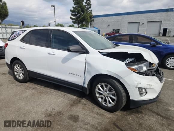 ✅ 2018 Chevrolet Equinox LS • VIN: 2GNAXHEVXJ6281369 • Lot: 82397065. Listed on Copart with 89,914 mi. Free auction sales archive from the USA and detailed vehicle history report at DreamBid. Image 4.