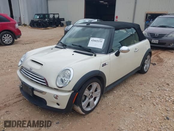 ✅ 2007 MINI Convertible S • VIN: WMWRH33597TL95200 • Lot: 42665233. Listed on IAAI with 76,917 mi. Free auction sales archive from the USA and detailed vehicle history report at DreamBid. Image 2.