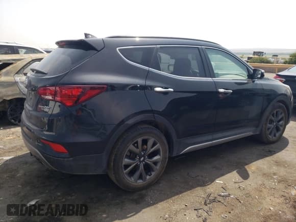 ✅ 2017 Hyundai Santa Fe Ultimate • VIN: 5XYZWDLA8HG470140 • Лот: 64397364. Опубликован ранее на Copart с пробегом Не указан. Бесплатный доступ к архиву аукционных продаж из США и подробный отчёт об истории автомобиля на DreamBid. Изображение 3.