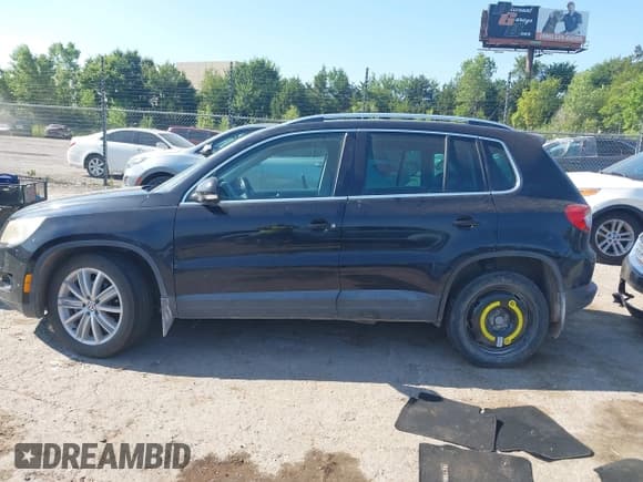 ✅ 2009 Volkswagen Tiguan S • VIN: WVGAV75N29W525411 • Lot: 43030909. Listed on IAAI with 152,930 mi. Free auction sales archive from the USA and detailed vehicle history report at DreamBid. Image 14.