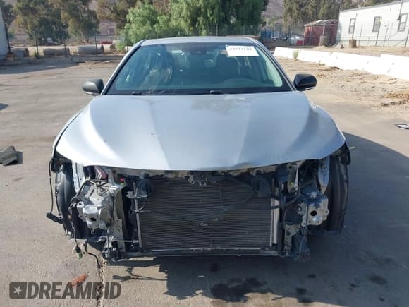 ✅ 2022 Toyota Camry Hybrid Nightshade • VIN: 4T1G31AK6NU033866 • Lot: 43541102. Listed on IAAI with 38,416 mi. Free auction sales archive from the USA and detailed vehicle history report at DreamBid. Image 12.