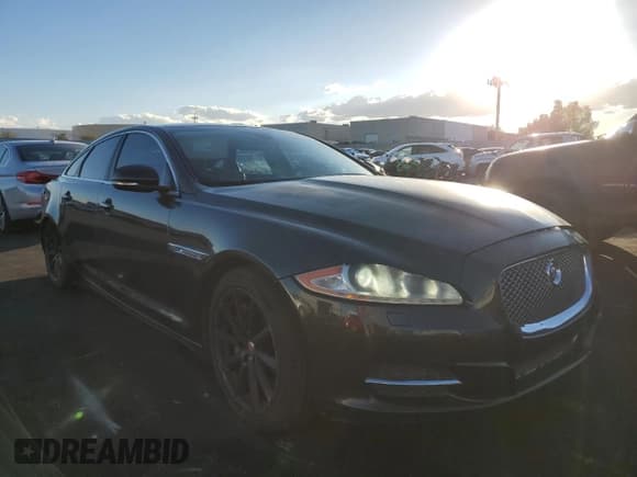 ✅ 2014 Jaguar XJ • VIN: SAJWA1CZ2E8V67795 • Лот: 89884265. Опубликован ранее на Copart с пробегом 129 717 миль. Бесплатный доступ к архиву аукционных продаж из США и подробный отчёт об истории автомобиля на DreamBid. Изображение 4.