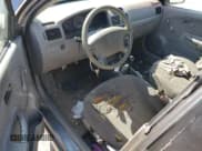 ✅ 2004 Kia Rio • VIN: KNADC125946307495 • Lot: 65368134. Listed on Copart with 141,256 mi. Free auction sales archive from the USA and detailed vehicle history report at DreamBid. Image 8.