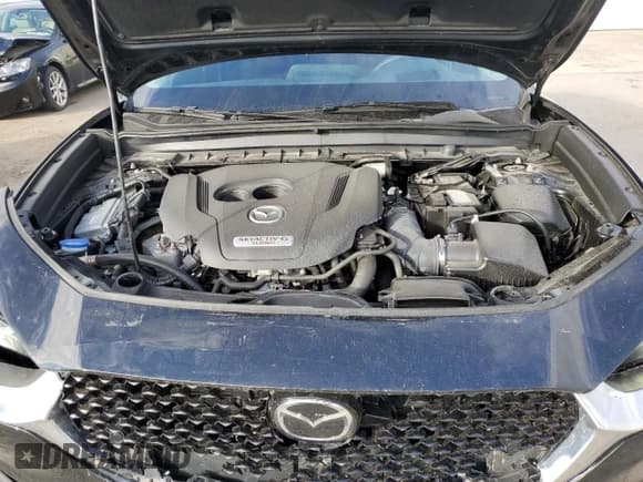 ✅ 2023 Mazda CX-30 Premium • VIN: 3MVDMBDY1PM585694 • Lot: 74969314. Listed on Copart with 9,740 mi. Free auction sales archive from the USA and detailed vehicle history report at DreamBid. Image 12.