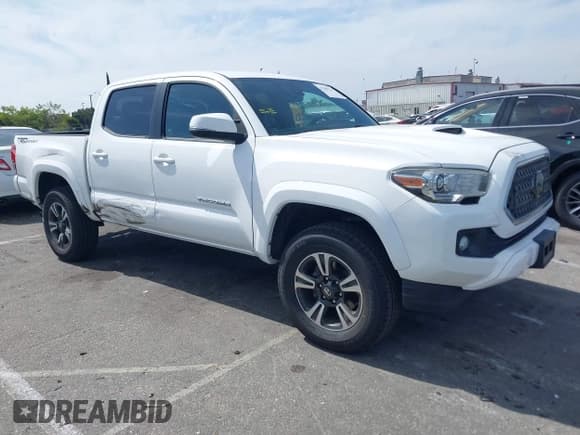 ✅ 2018 Toyota Tacoma SR5 • VIN: 3TMAZ5CN7JM063352 • Lot: 42289276. Listed on IAAI with 84,360 mi. Free auction sales archive from the USA and detailed vehicle history report at DreamBid. Image 1.