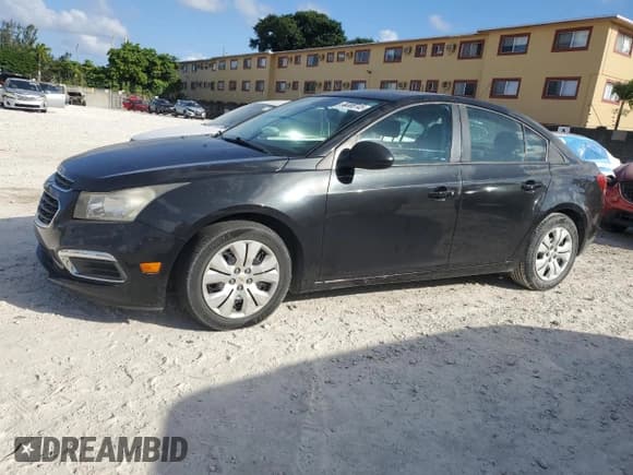 ✅ 2015 Chevrolet Cruze LS • VIN: 1G1PA5SH7F7178444 • Lot: 90308745. Listed on Copart with 74,681 mi. Free auction sales archive from the USA and detailed vehicle history report at DreamBid. Image 1.