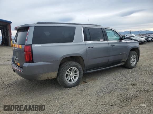 ✅ 2020 Chevrolet Suburban LT • VIN: 1GNSKHKC3LR270601 • Лот: 87431125. Опубликован ранее на Copart с пробегом 217 710 миль. Бесплатный доступ к архиву аукционных продаж из США и подробный отчёт об истории автомобиля на DreamBid. Изображение 3.