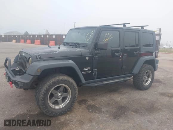 ✅ 2008 Jeep Wrangler Unlimited Sahara • VIN: 1J4GA59158L636793 • Lot: 43466197. Listed on IAAI with 239,794 mi. Free auction sales archive from the USA and detailed vehicle history report at DreamBid. Image 14.