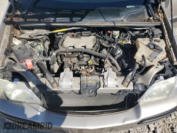 2003 Chevrolet Venture w/LT 1SD Pkg z VIN 1GNDX03E63D124945, wystawiony jako Copart lot #70747535 z przebiegiem 241 123 mil mil oraz Nie do naprawy • Non repairable. Historia ofert i sprzedaży dostępna na DreamBid. Obrazek 12.