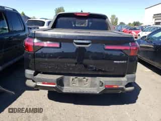 2023 Hyundai Santa Cruz Night Edition с VIN 5NTJCDAF6PH071871, выставлен на аукционе Copart как лот 64869504 с пробегом 14 432 миль миль и Списание • Salvage title. История ставок и продаж доступна на DreamBid. Изображение 6.