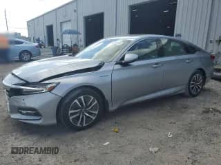 2019 Honda Accord Touring with VIN 1HGCV3F98KA014779, listed as a Copart auction lot 69408345 with 124,356 mi miles and Salvage title. Bid and sale history available at DreamBid. Image 1.
