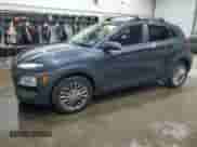 2021 Hyundai Kona SEL z VIN KM8K2CAA1MU673532, wystawiony jako Copart lot #66547565 z przebiegiem 143 139 mil mil oraz Szkoda całkowita • Salvage title. Historia ofert i sprzedaży dostępna na DreamBid. Obrazek 1.