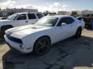 ✅ 2012 Dodge Challenger SXT • VIN: 2C3CDYAGXCH170592 • Lot: 45268205. Wystawiony na Copart z przebiegiem 144 230 mil. Bezpłatny archiwum sprzedaży aukcyjnych z USA i szczegółowy raport historii pojazdu na DreamBid. Zdjęcie 1.