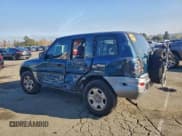 ✅ 2000 Toyota RAV4 • VIN: JT3HP10V2Y0233457 • Лот: 94384195. Опубликован ранее на Copart с пробегом 238 552 миль. Бесплатный доступ к архиву аукционных продаж из США и подробный отчёт об истории автомобиля на DreamBid. Изображение 2.