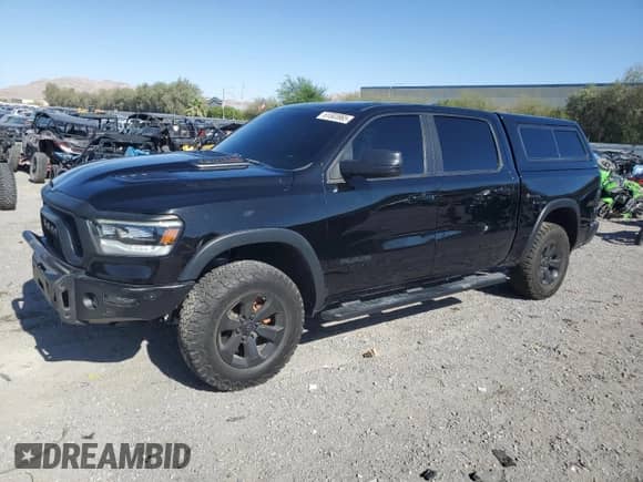 2020 Ram 1500 Rebel z VIN 1C6SRFLM6LN286161, wystawiony jako Copart lot #61503965 z przebiegiem 119 391 mil mil oraz Szkoda całkowita • Salvage title. Historia ofert i sprzedaży dostępna na DreamBid. Obrazek 1.