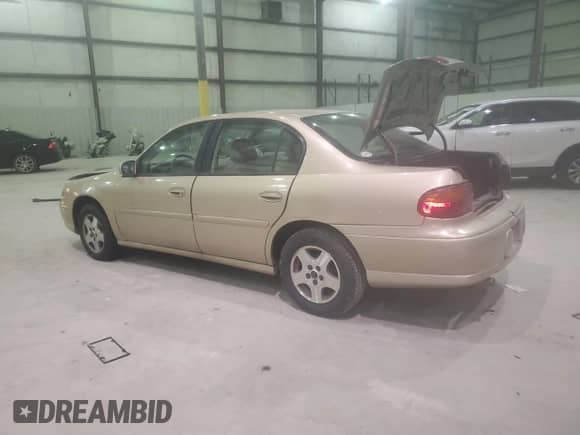 2003 Chevrolet Malibu LS z VIN 1G1NE52J03M675783, wystawiony jako Copart lot #83032764 z przebiegiem 185 343 mil mil oraz Nie do naprawy • Non repairable. Historia ofert i sprzedaży dostępna na DreamBid. Obrazek 2.