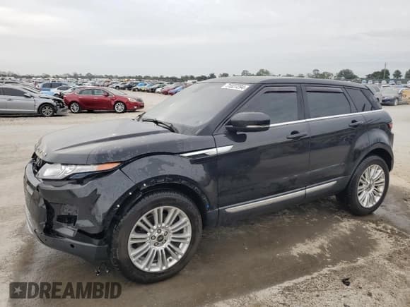 ✅ 2013 Land Rover Range Rover Evoque Prestige Premium • VIN: SALVV2BG5DH848114 • Lot: 71027294. Wystawiony na Copart z przebiegiem 136 214 mil. Bezpłatny archiwum sprzedaży aukcyjnych z USA i szczegółowy raport historii pojazdu na DreamBid. Zdjęcie 1.