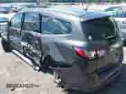 2014 Chevrolet Traverse LT z VIN 1GNKRGKD6EJ290499, wystawiony jako IAAI lot #42604884 z przebiegiem 169 701 mil mil oraz . Historia ofert i sprzedaży dostępna na DreamBid. Obrazek 3.