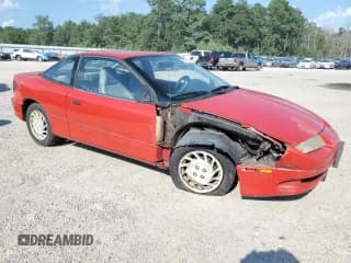 ✅ 1995 Saturn SC • VIN: 1G8ZE1285SZ141155 • Лот: 65757374. Опубликован ранее на Copart с пробегом 150 973 миль. Бесплатный доступ к архиву аукционных продаж из США и подробный отчёт об истории автомобиля на DreamBid. Изображение 4.