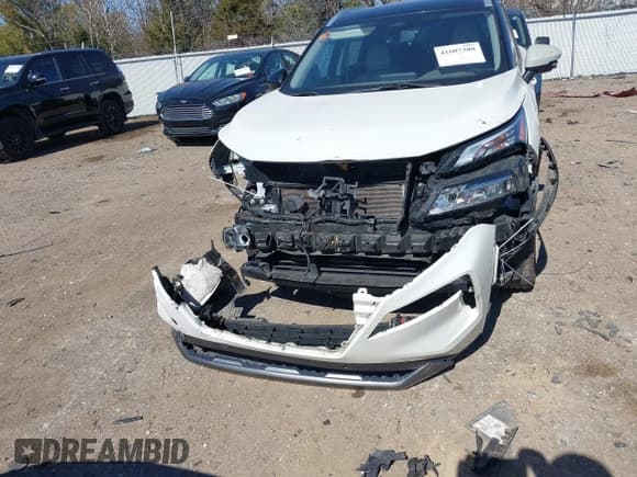 ✅ 2022 Nissan Rogue SL • VIN: JN8BT3CA8NW041572 • Lot: 41607388. Listed on IAAI with 58,886 mi. Free auction sales archive from the USA and detailed vehicle history report at DreamBid. Image 12.