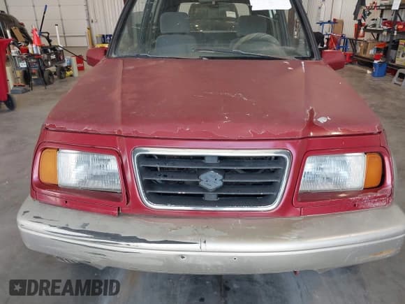 ✅ 1997 Suzuki Sidekick • VIN: JS3TD21VXV4109381 • Лот: 42745244. Опубликован ранее на IAAI с пробегом 195 973 миль. Бесплатный доступ к архиву аукционных продаж из США и подробный отчёт об истории автомобиля на DreamBid. Изображение 10.