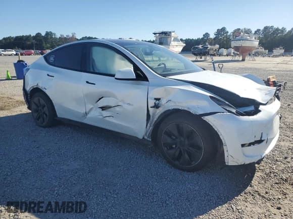 ✅ 2024 Tesla Model Y Long Range • VIN: 7SAYGDEE4RA319636 • Лот: 87390475. Опубликован ранее на Copart с пробегом 19 479 миль. Бесплатный доступ к архиву аукционных продаж из США и подробный отчёт об истории автомобиля на DreamBid. Изображение 4.